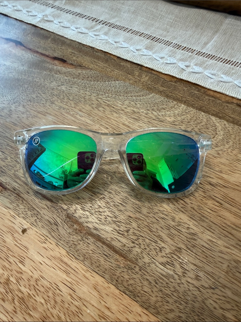 Clear Frame Sunglasses with Green Mirrored Lenses